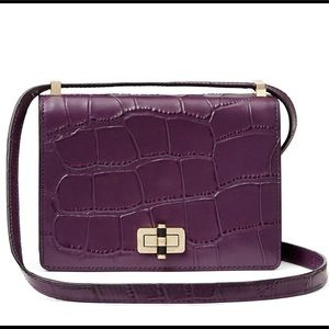 Purple leather DVF crossbody purse.